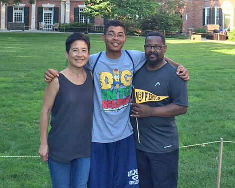 parents and son on college campus