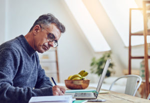 man working at laptop